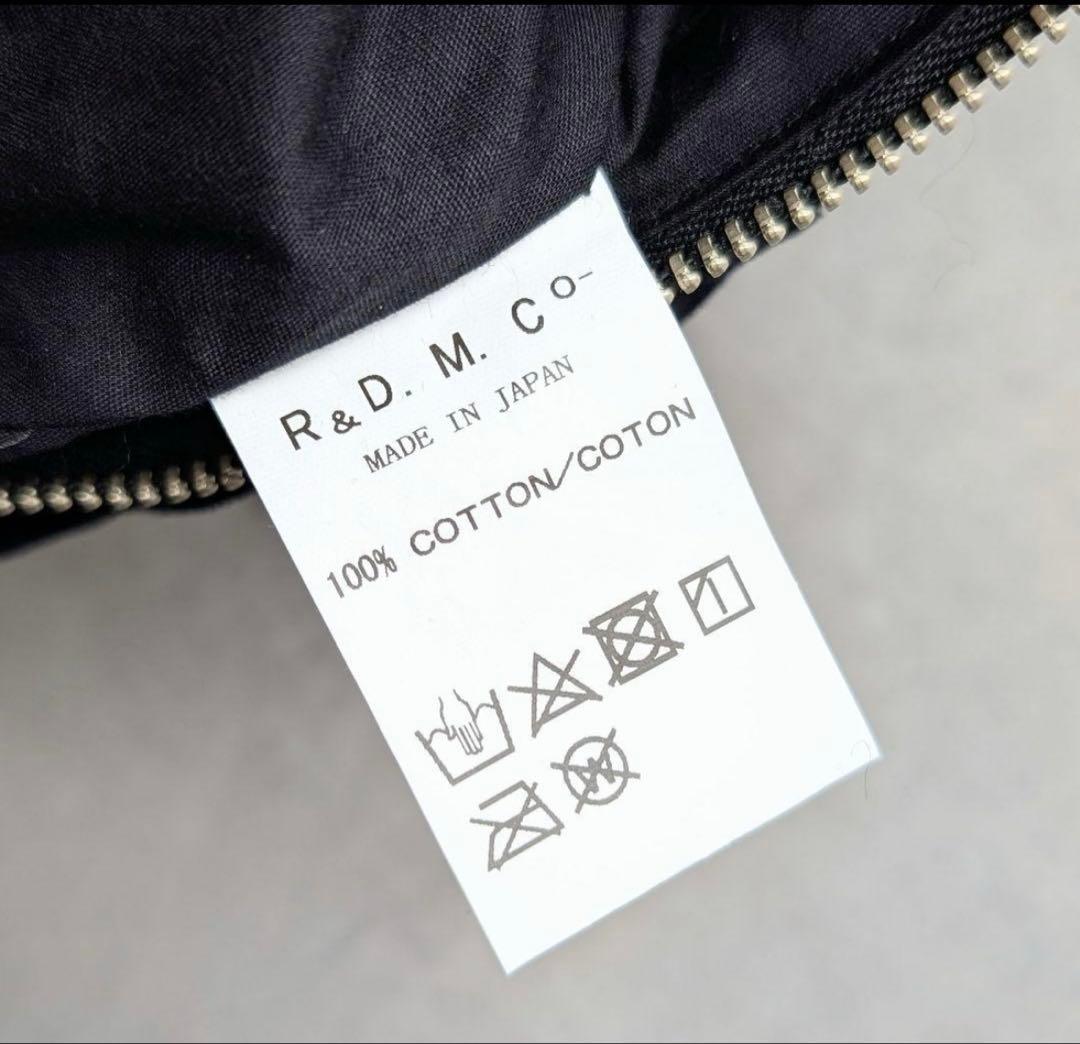 オールドマンズテーラー ガーメントダイタイプライターフリルボディバッグ