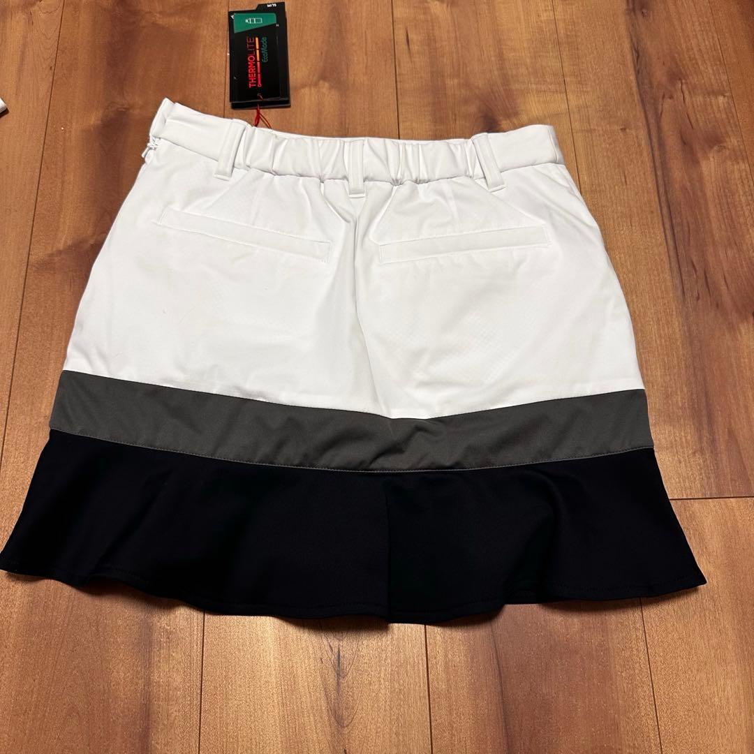 上下裏起毛　中綿スカート　ハイネック長袖　ペプラム　秋冬　セットアップ　ブラック