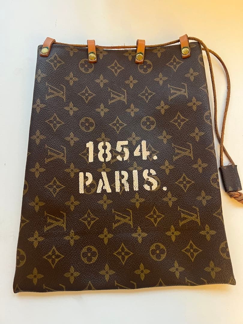 週末お値下げ　h.myriad リメイクバッグ　巾着バッグ