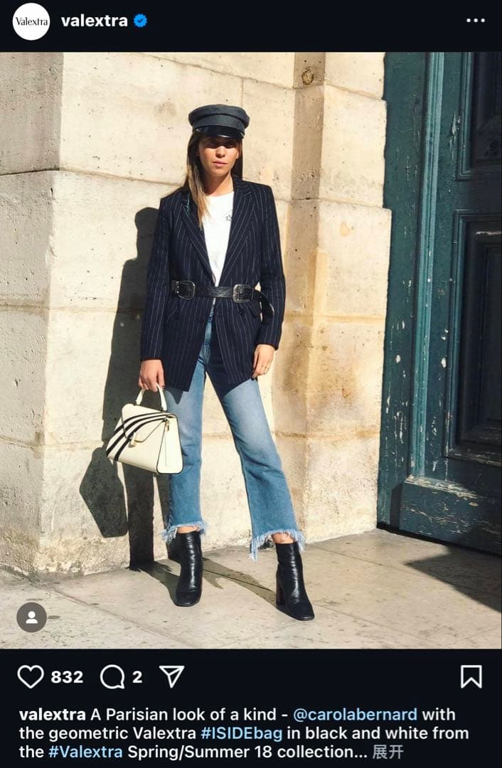 V alextra エレガントなアイボリーとブラックのハンドバッグ