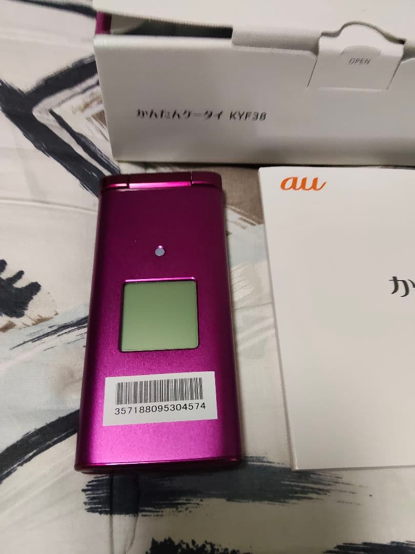 KYF38赤 極美品　新品バッテリー付き　　simロック解除済み