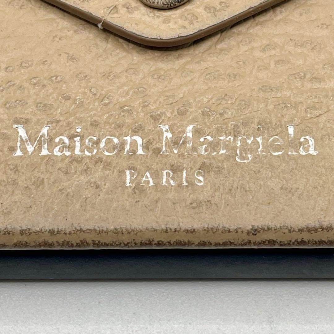 メゾンマルジェラ iPhoneケース 14 Pro対応 チェーンストラップ付き