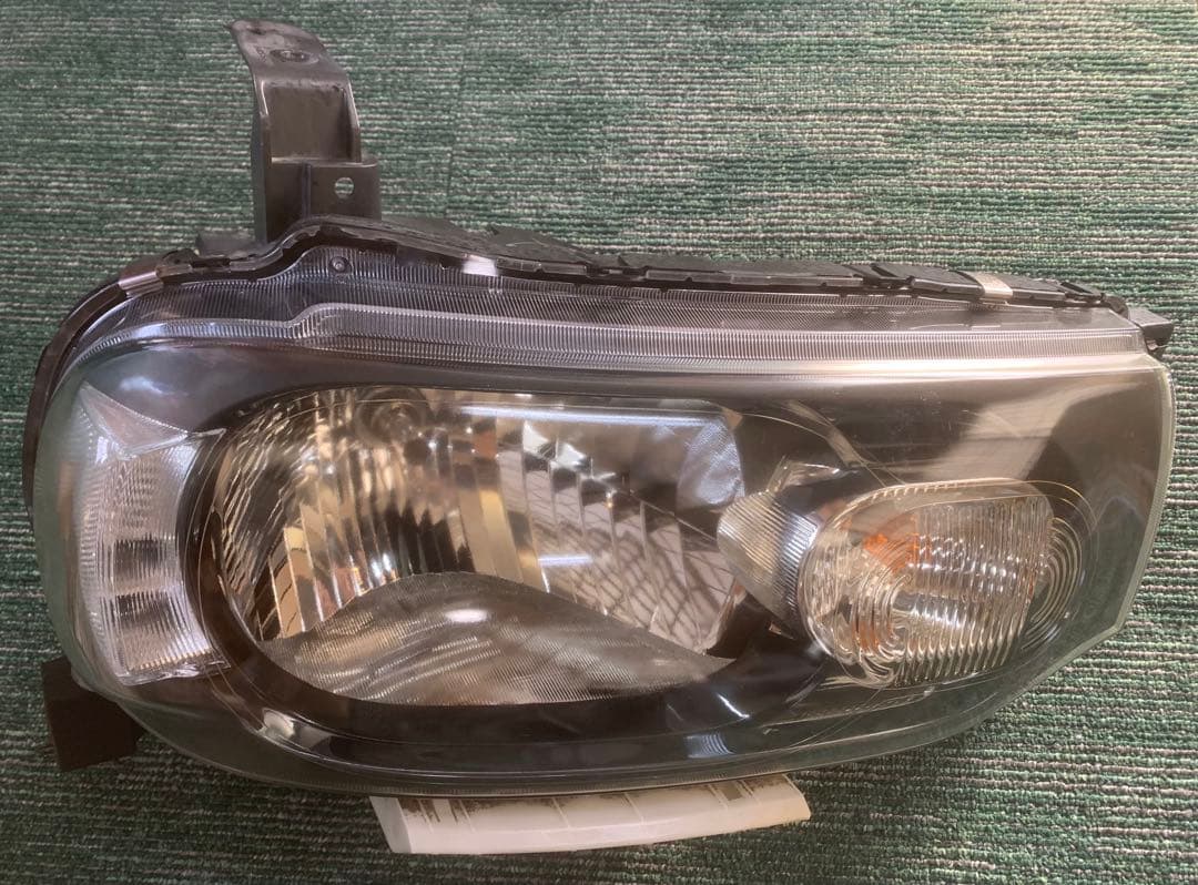 日産 キューブZ12左右ヘッドライト ハロゲンSTANLEY P8190