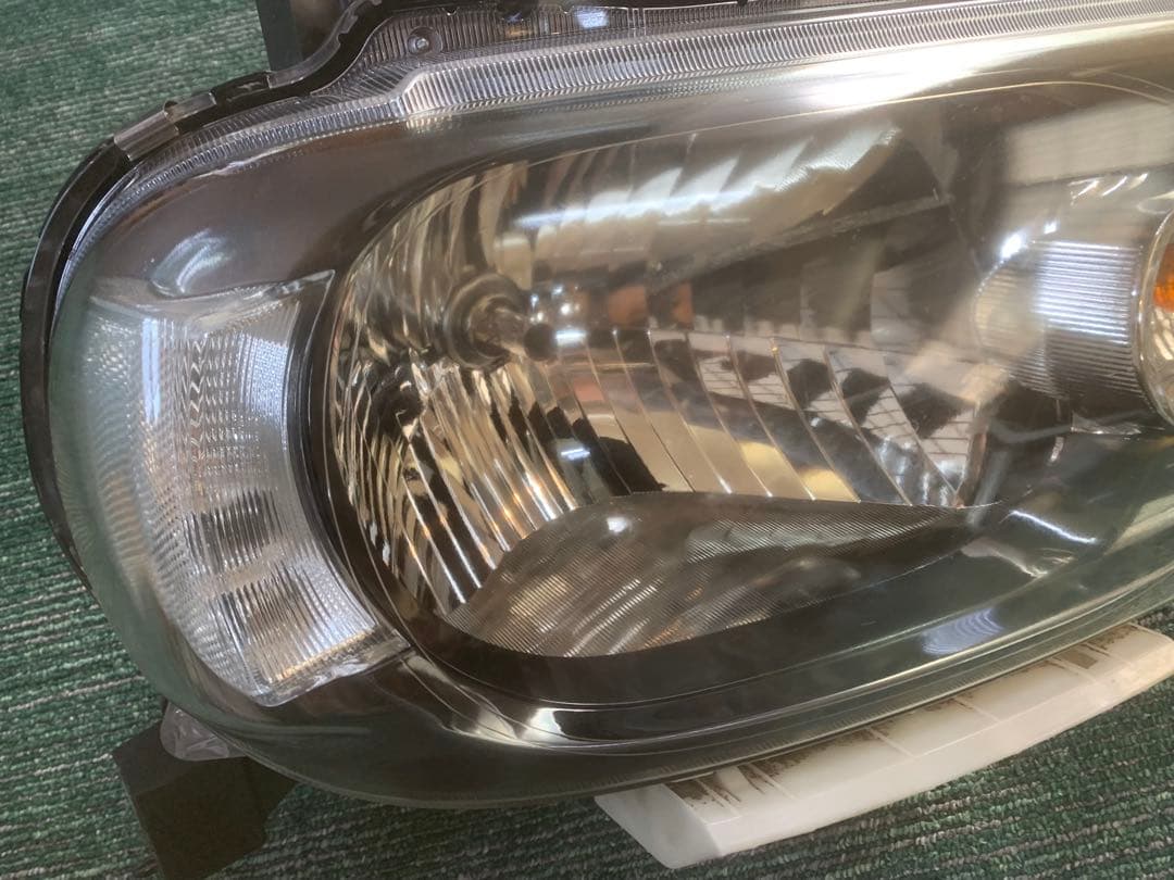 日産 キューブZ12左右ヘッドライト ハロゲンSTANLEY P8190
