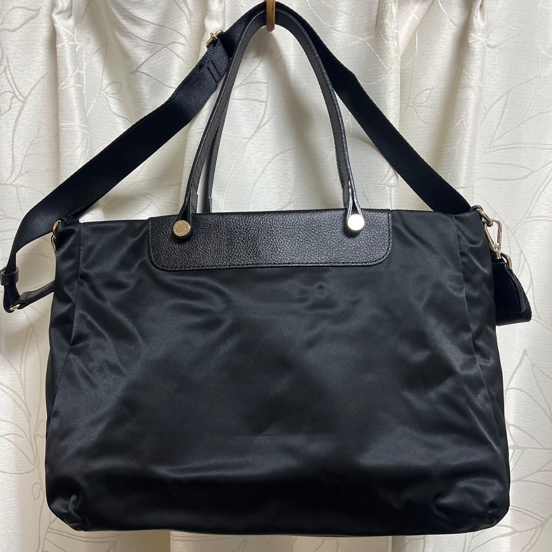 ほぼ未使用ラシット今期A4入るポケット多数三層構造メタルロゴ2wayバッグ