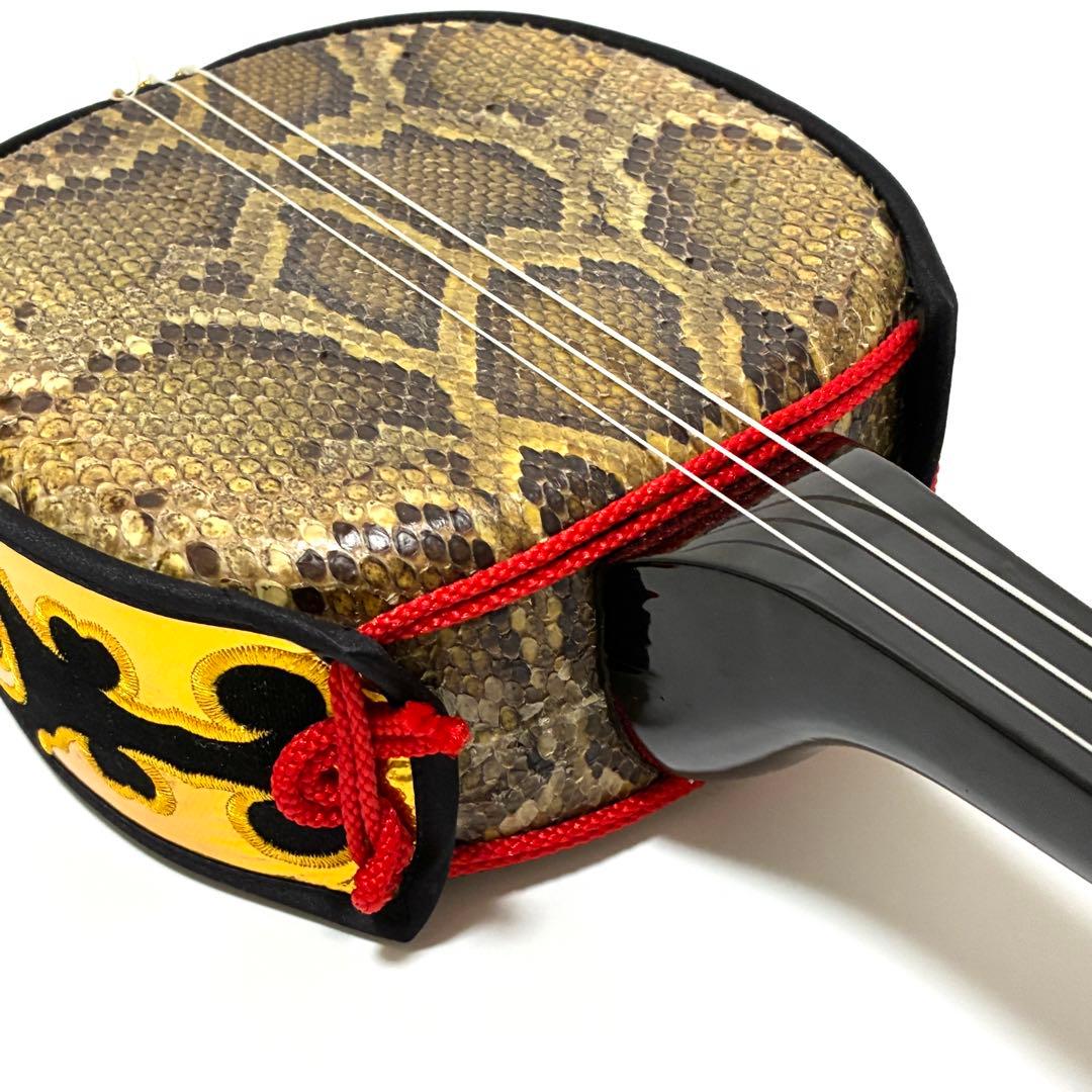 沖縄三味線 蛇皮 本革 黒 爪 ハードケース付き