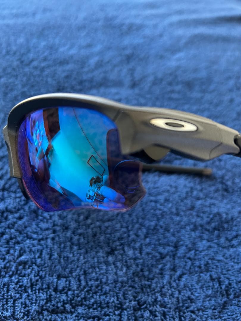 Oakley サングラス ブラックフレーム ブルーレンズ
