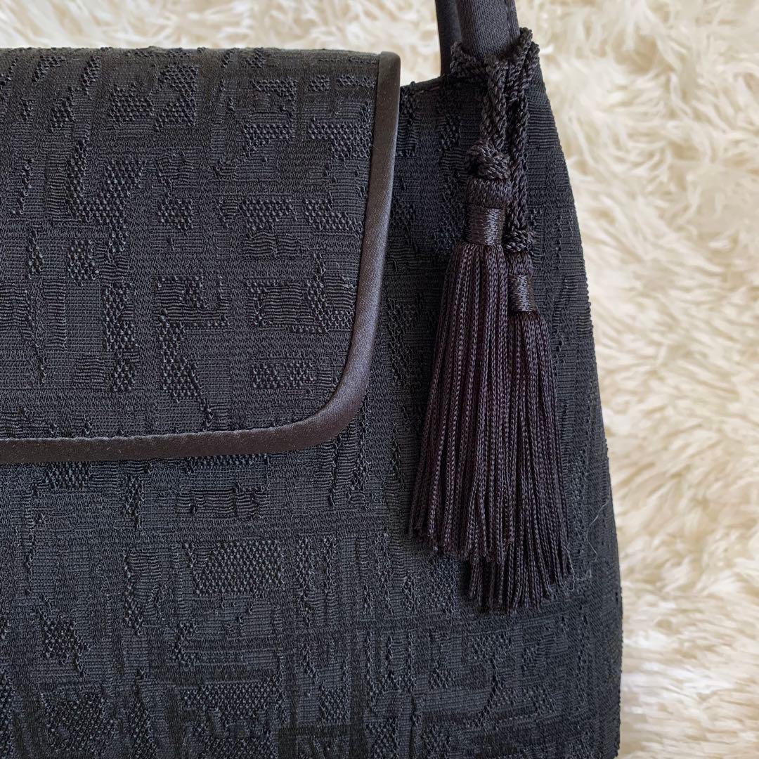 くみちゃん様　IWASA 岩佐　米沢織　フォーマルバッグ ブラック　タッセル付き