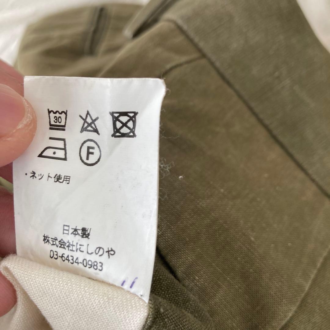 NEAT ミリタリーテント地 タック入り オリーブ グリーン チノパン