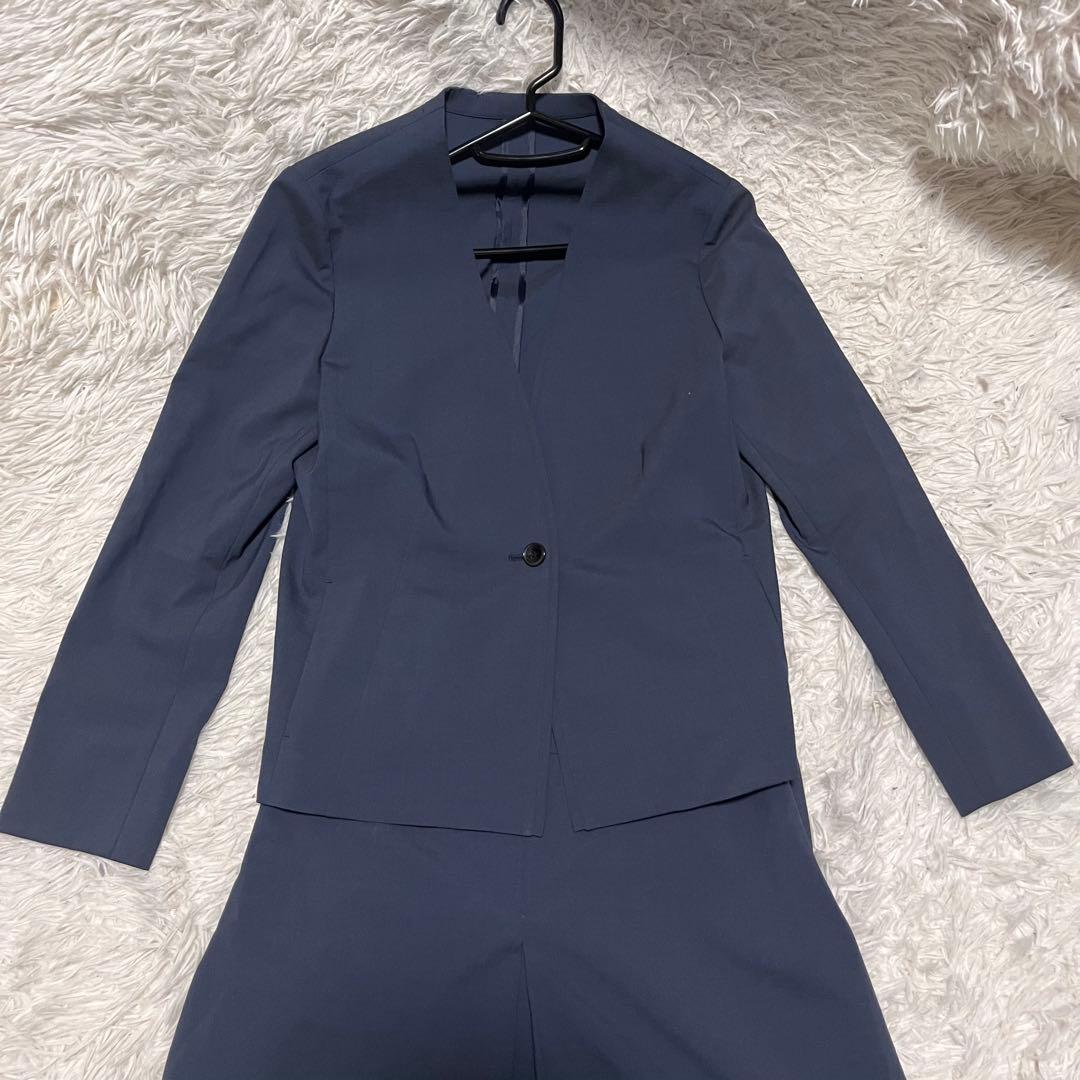 ネイビー ビジネススーツ ニューヨーカー　ノーカラースーツ
