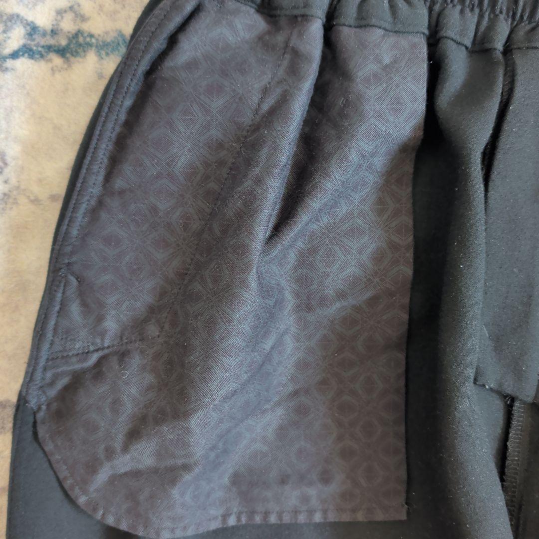 ホワイトマウンテニアリング ストレッチド テーパード サルエルパンツ