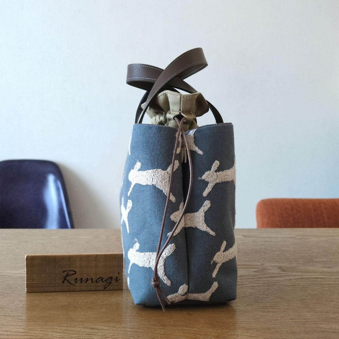 【1569】あおりポケットの巾着バッグ＊ミナペルホネン