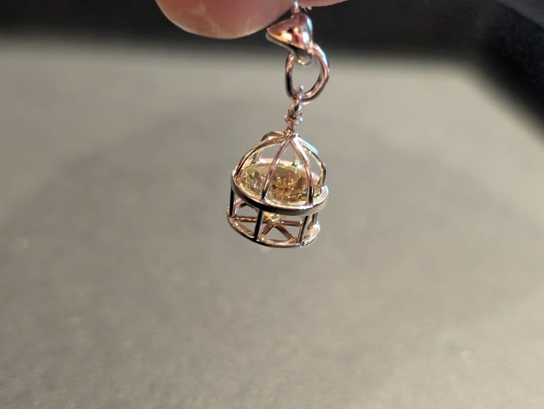 e.m.イーエム　黄色いジルコニアの入った鳥かごのピアス　片耳　SILVER