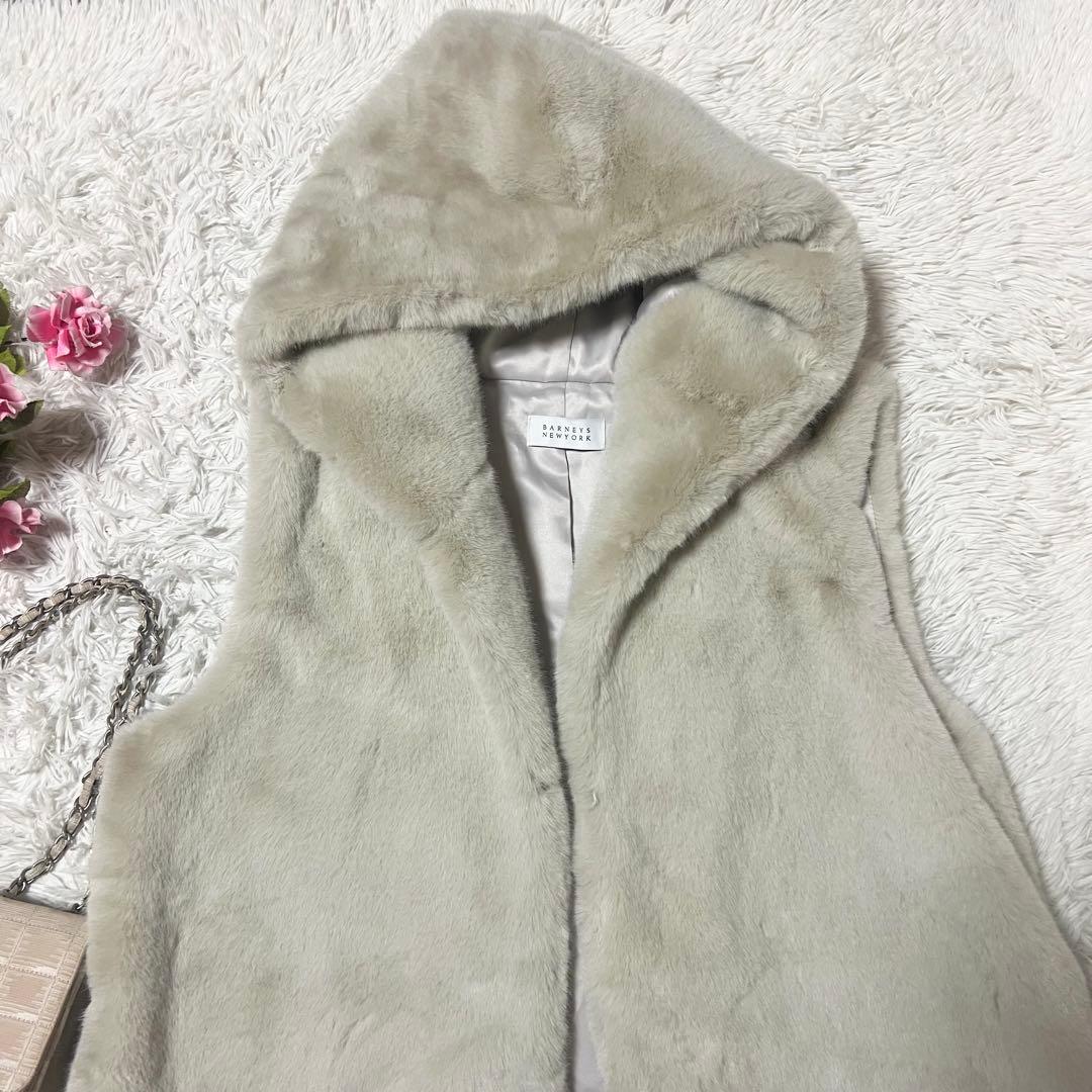 【SALE】バーニーズニューヨーク フェイクファーベスト フード ロングジレ