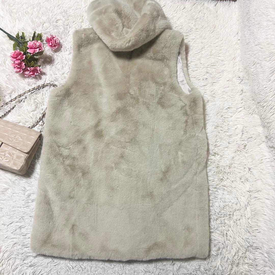 【SALE】バーニーズニューヨーク フェイクファーベスト フード ロングジレ