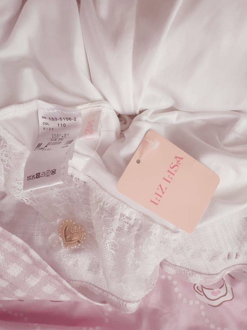 タグ付き LIZLISA はしごリボンギンガムティアードスカパン ピンク