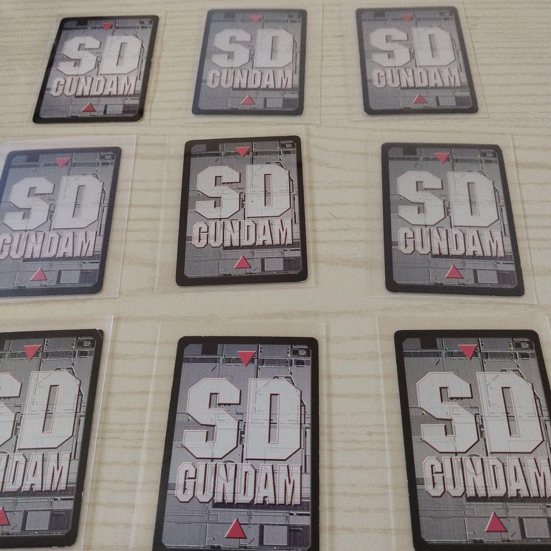 SDガンダムカードゲーム　モビルパワーズカードダス１１５枚と対戦シートとバイブル