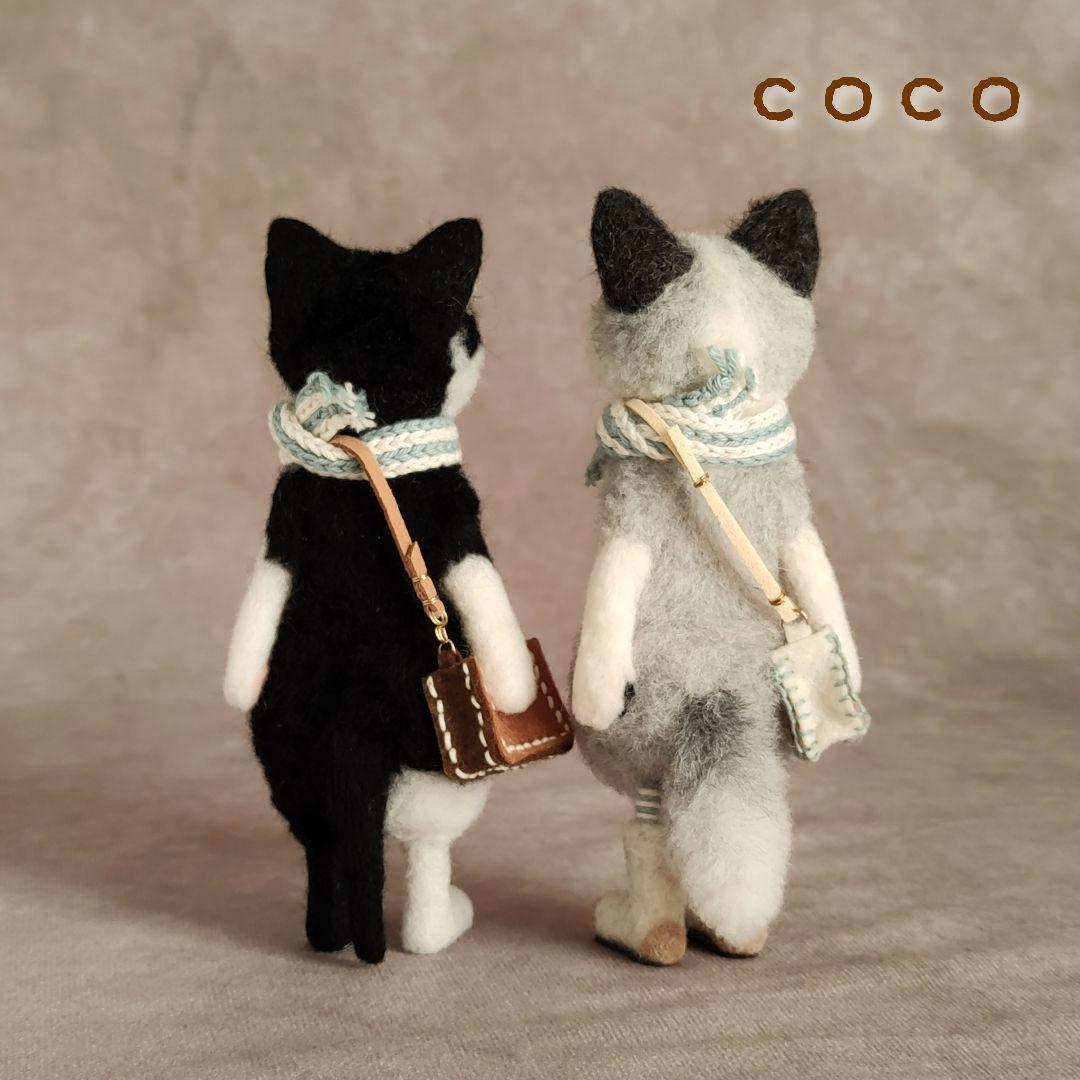 ショルダーバックを下げた小まめさん