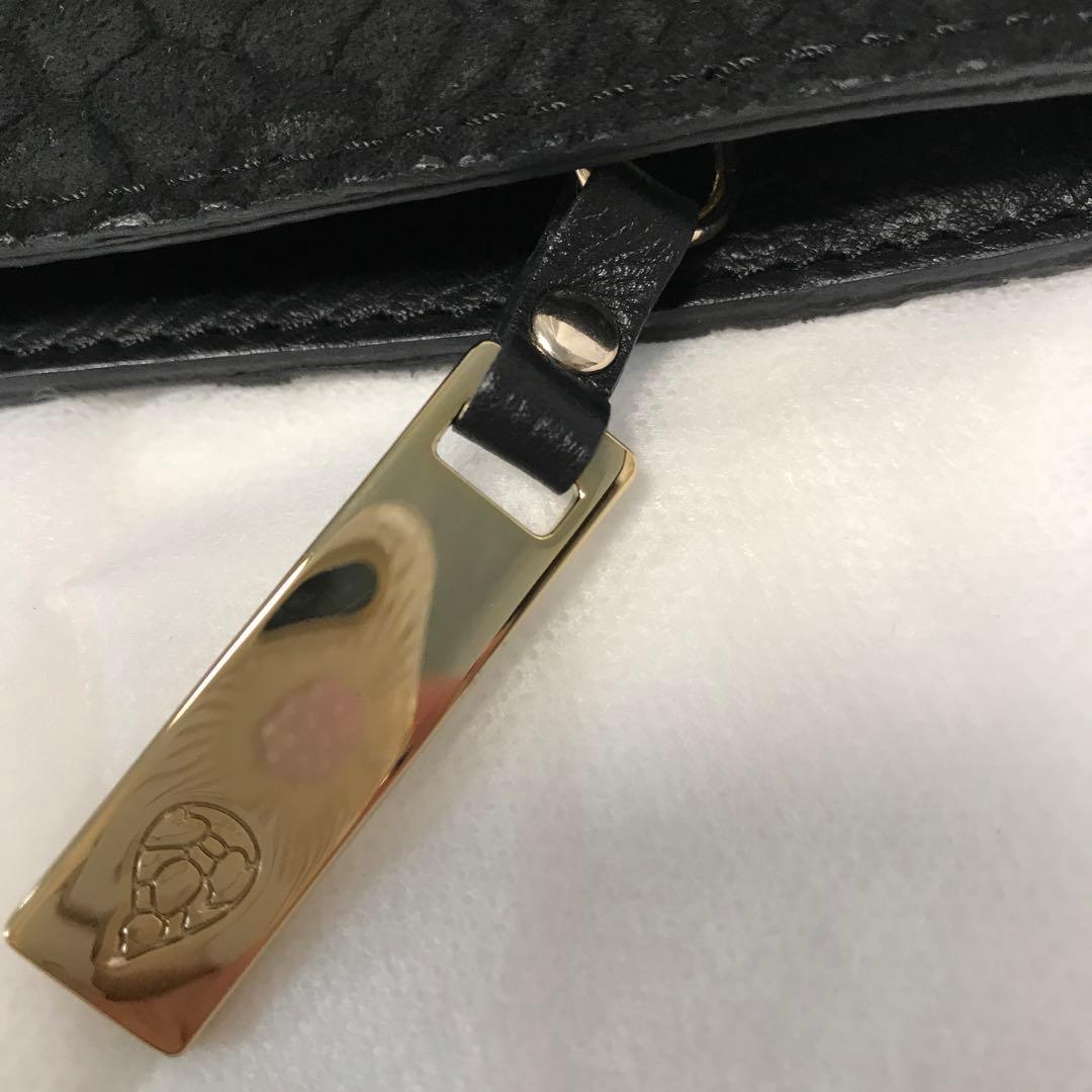 ヘレンカミンスキー パイソン型押し本革+ラヒィア　クラッチ　女優スタイル