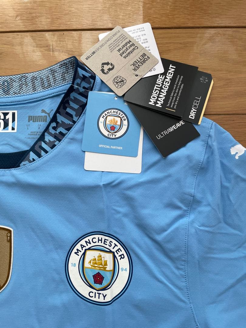 【未使用美品】マンシティ2023-24四連覇優勝記念ウェア　シリアル番号161