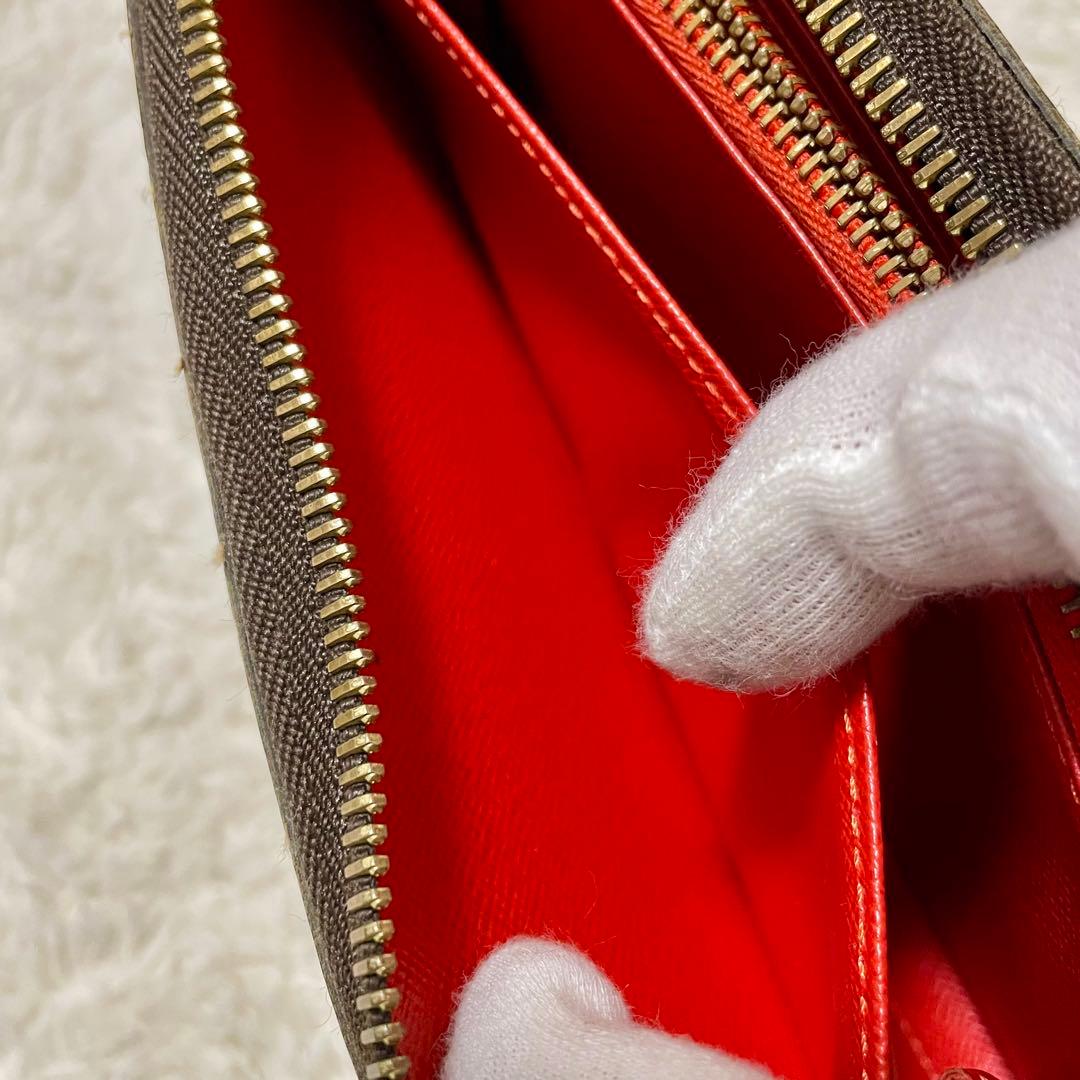 ルイヴィトン モノグラム ステッカー ジッピーウォレット コクリコ M62149