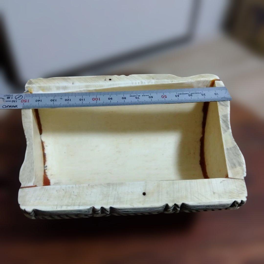 【ナリトラです】縁起置物　宝尽し図　書道の腕枕？　座布団付き