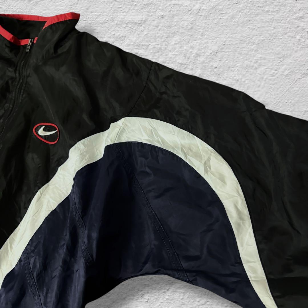 nikeナイキナイロンジャケット90sビッグロゴvintage古着ブラック刺繍L