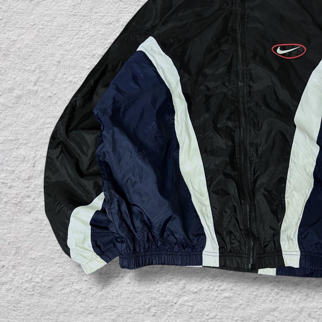 nikeナイキナイロンジャケット90sビッグロゴvintage古着ブラック刺繍L