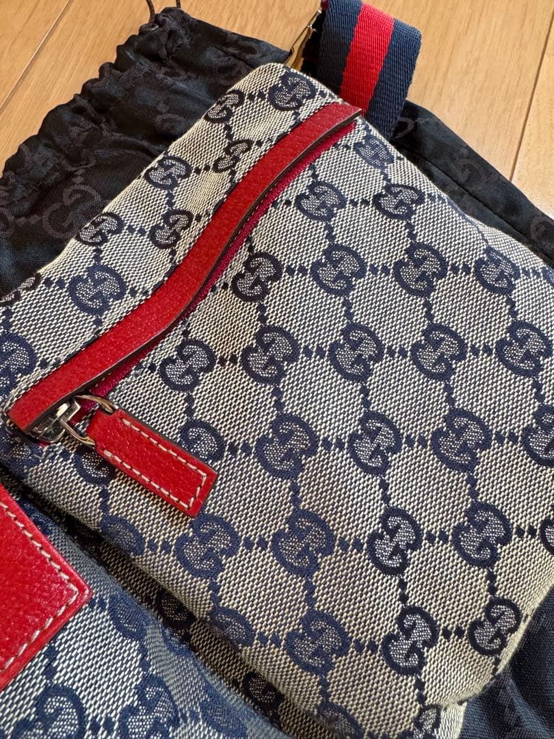 Gucci（グッチ）GGキャンバス × レザー ダブルポケット ベルトバッグ