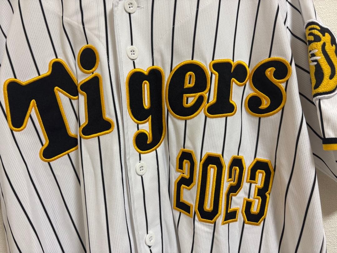 阪神タイガース　Tigers 2023 日本チャンピオン ユニフォーム　Lサイズ