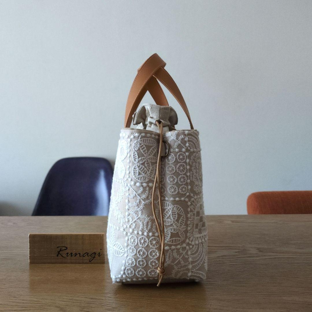 【1560】あおりポケットの巾着バッグ＊ミナペルホネン