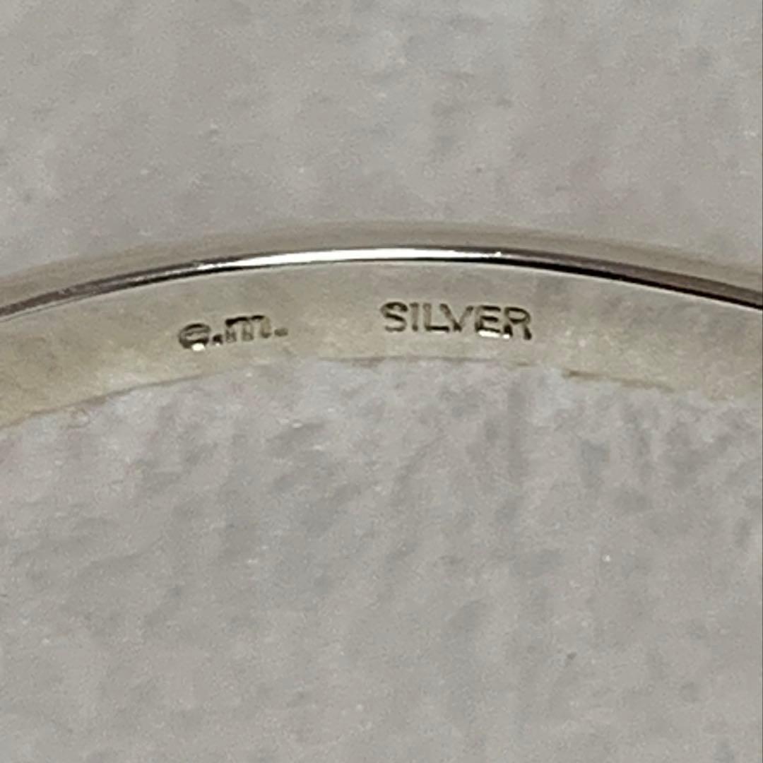 e.m. シルバー ハーフ バングル ゴールド チャーム付き