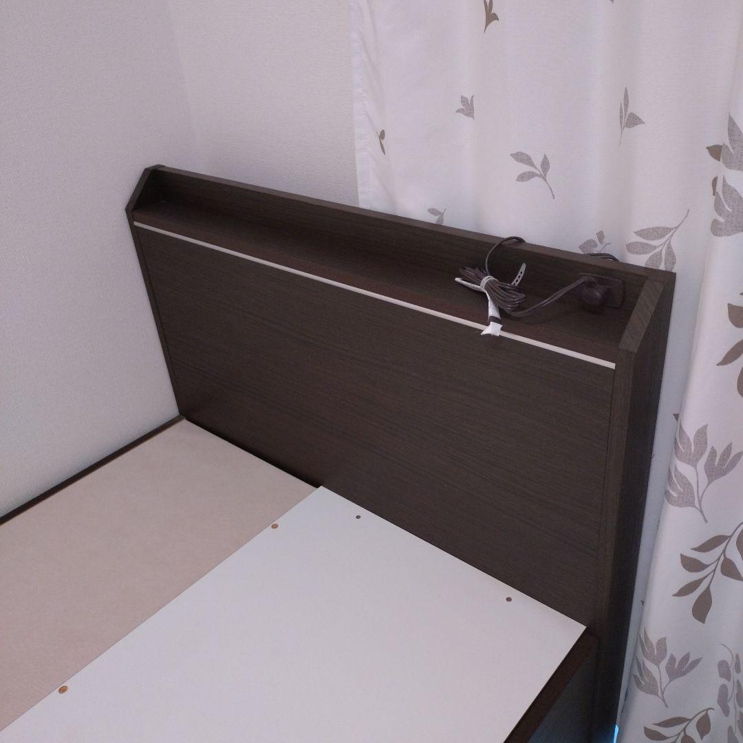 収納付きダークブラウンベッド