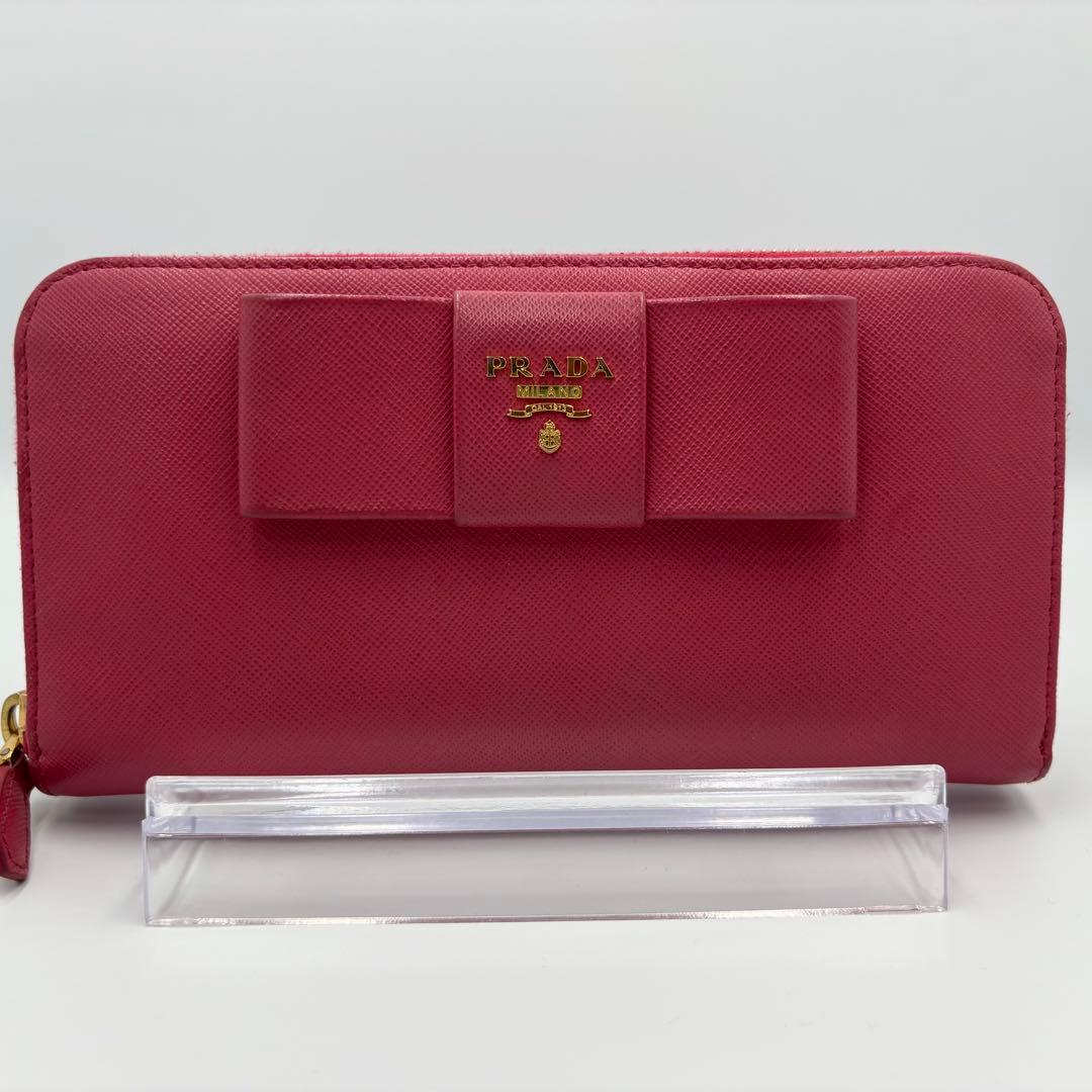 【美品】PRADA 長財布 ラウンド リボン メタルロゴ サフィアーノレザー
