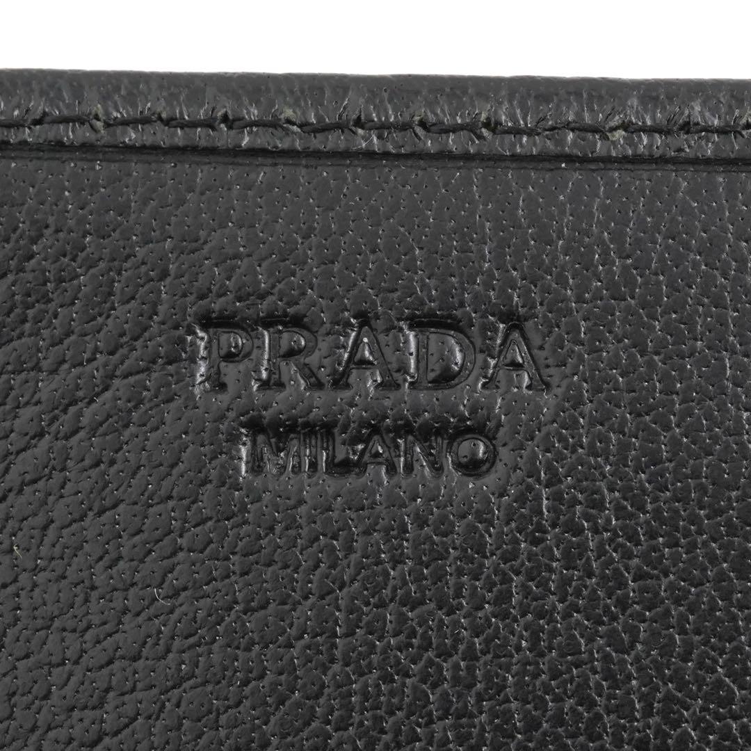 ✨新品未使用・箱付　PRADA 長財布　三角プレート　トライアングル　パンチング