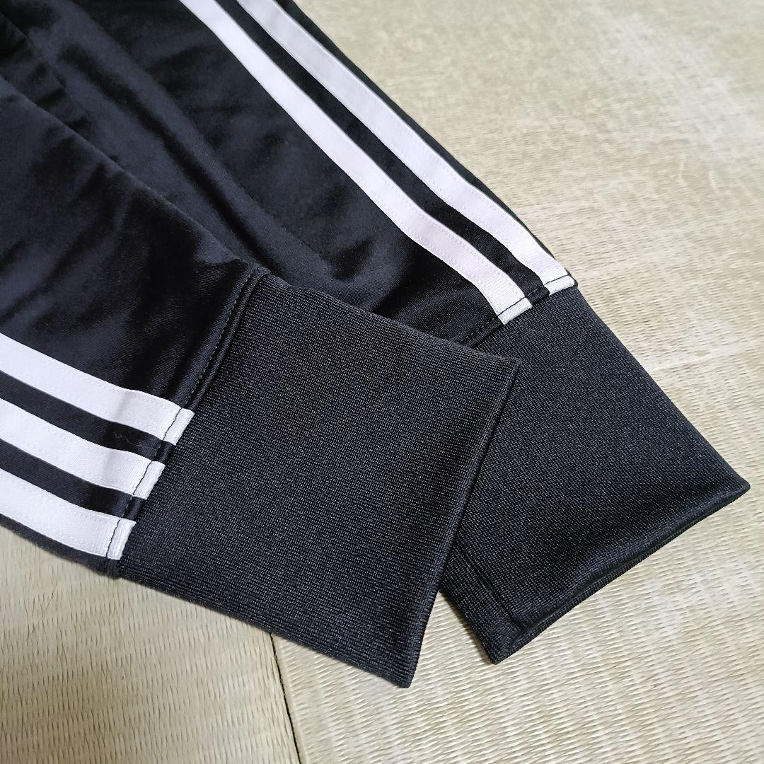 アディダス 黒 ファイヤーバード 襟高 トラックトップ ジャージ女性XL人気短丈