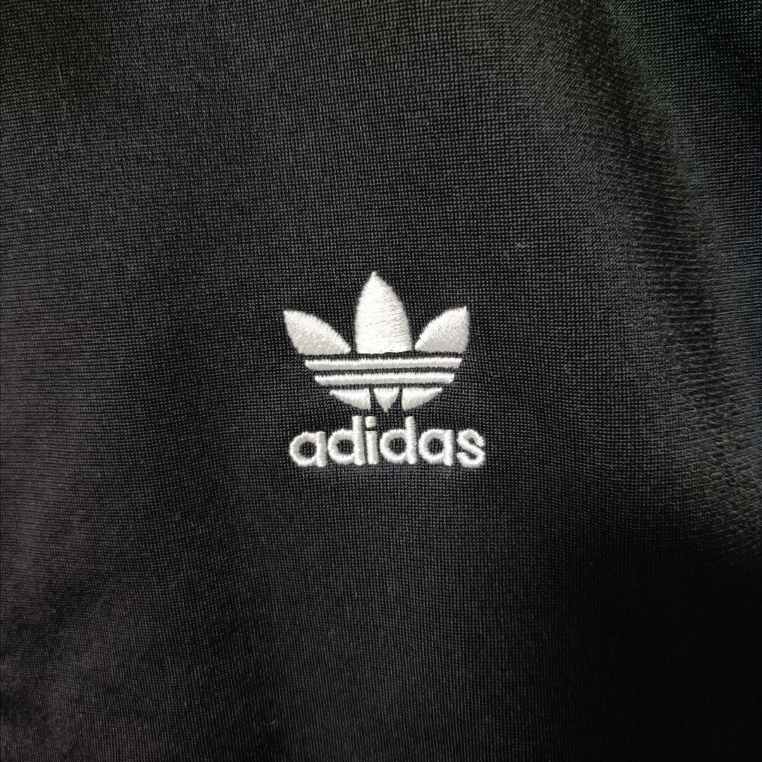 アディダス 黒 ファイヤーバード 襟高 トラックトップ ジャージ女性XL人気短丈