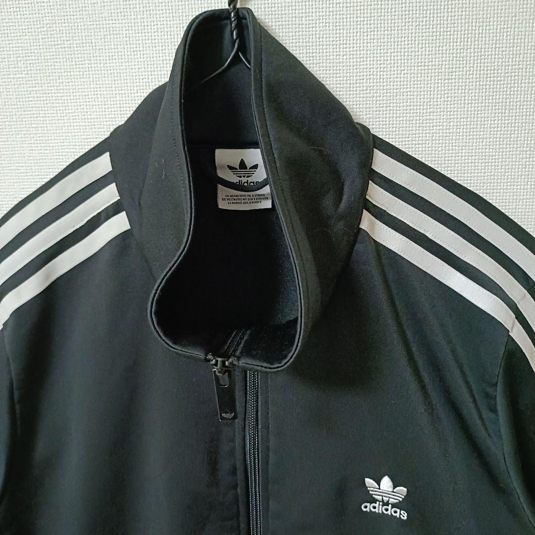 アディダス 黒 ファイヤーバード 襟高 トラックトップ ジャージ女性XL人気短丈