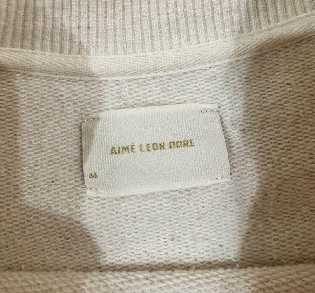 エメレオンドレ Unisphere Crewneck Sweatshirt