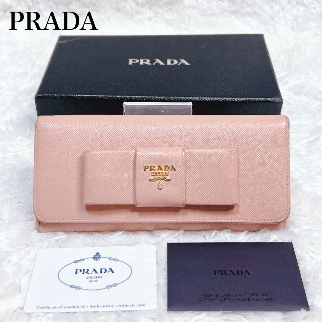 PRADA プラダ　長財布　サフィアーノ　フィオッコ　メタルロゴ　ピンク　リボン
