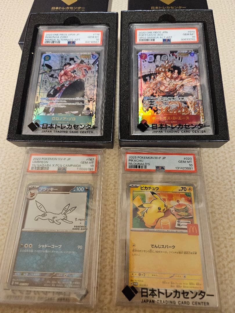 ワンピースコミパラ ゾロ エース ポケモンピカチュウ ブラッキー ４枚セット