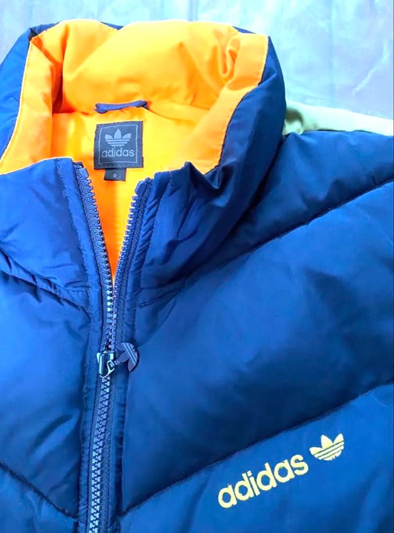 新品未使用に近い　adidas 中綿入りダウンベスト 紺／オレンジ　O