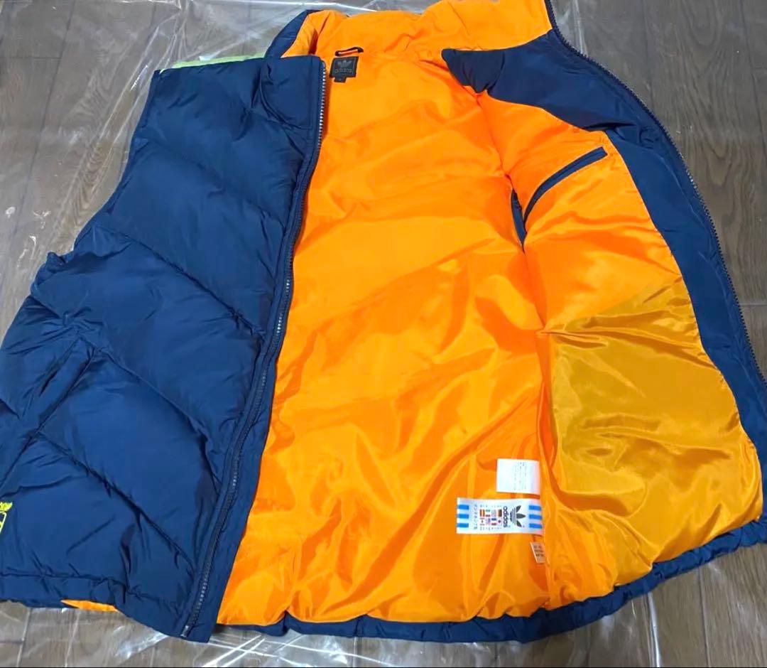 新品未使用に近い　adidas 中綿入りダウンベスト 紺／オレンジ　O