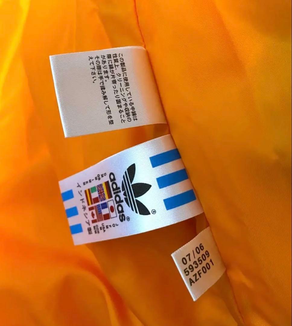 新品未使用に近い　adidas 中綿入りダウンベスト 紺／オレンジ　O