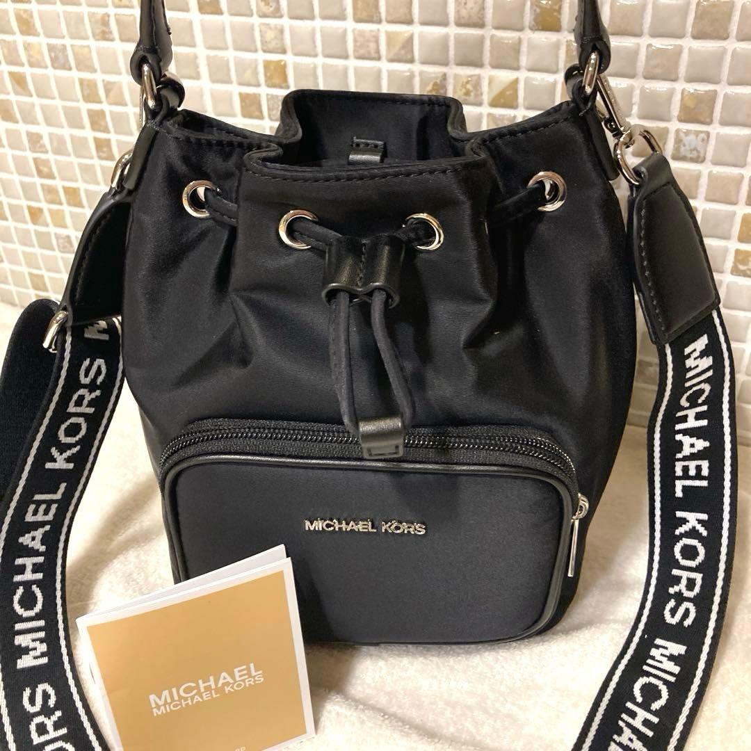 マイケルコース　巾着バッグ　ショルダーバッグ　ハンドバッグ　2WAY KHAI