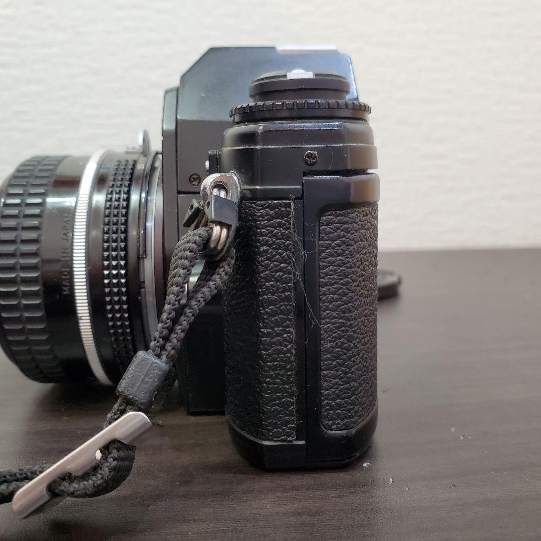 Nikon EM + NIKKOR 50mm F1.8 Ai ストラップ付