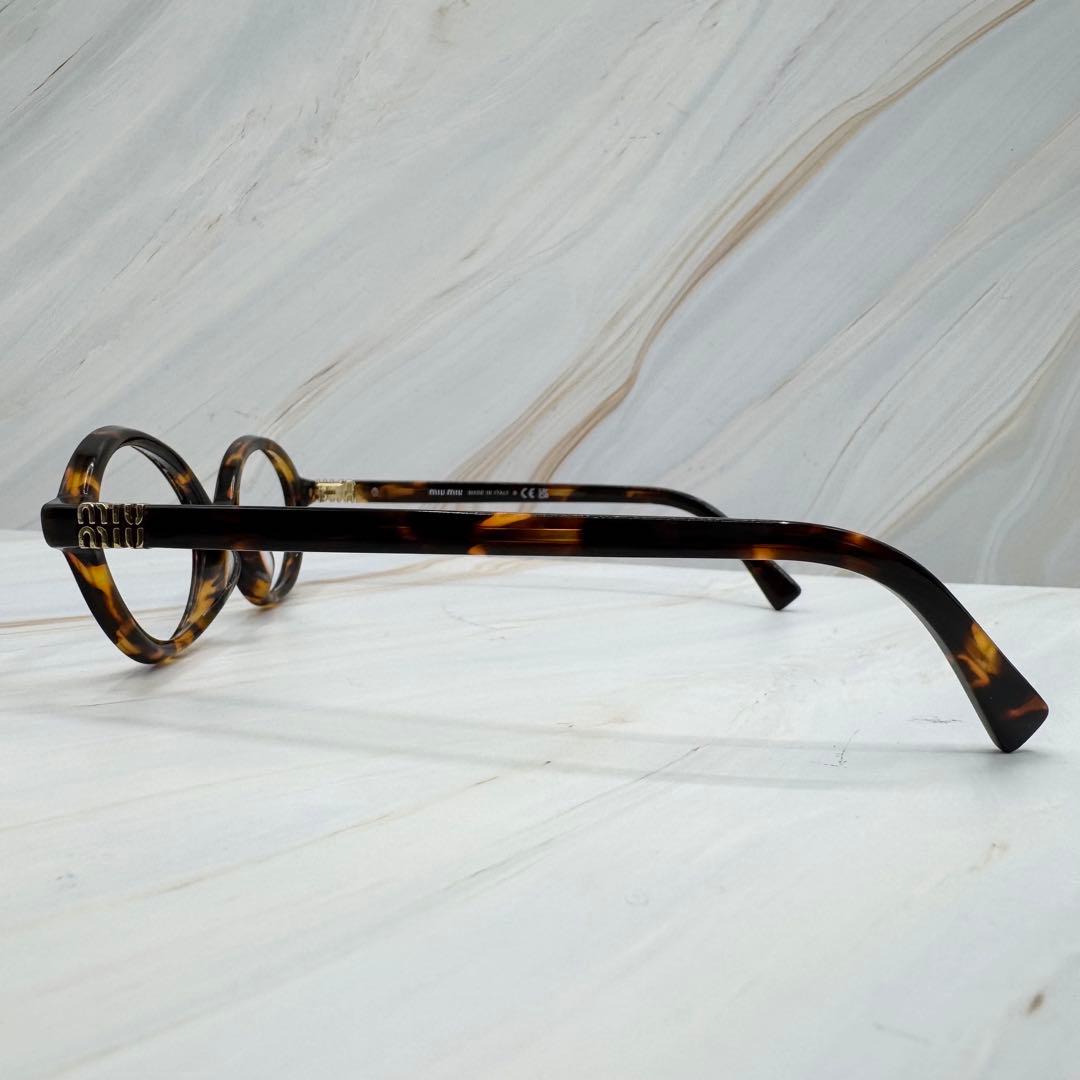 【ミュウミュウ】ウォニョン着用　 レンズなし　伊達メガネ べっこう柄　ロゴ