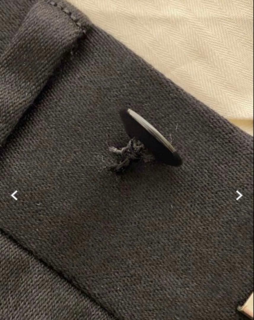 NEAT ブラック テーパードスラックス