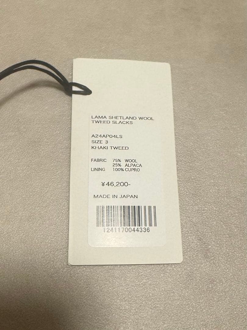 パンツ AURALEE LAMASHETLANDWOOLTWEEDSLACKS