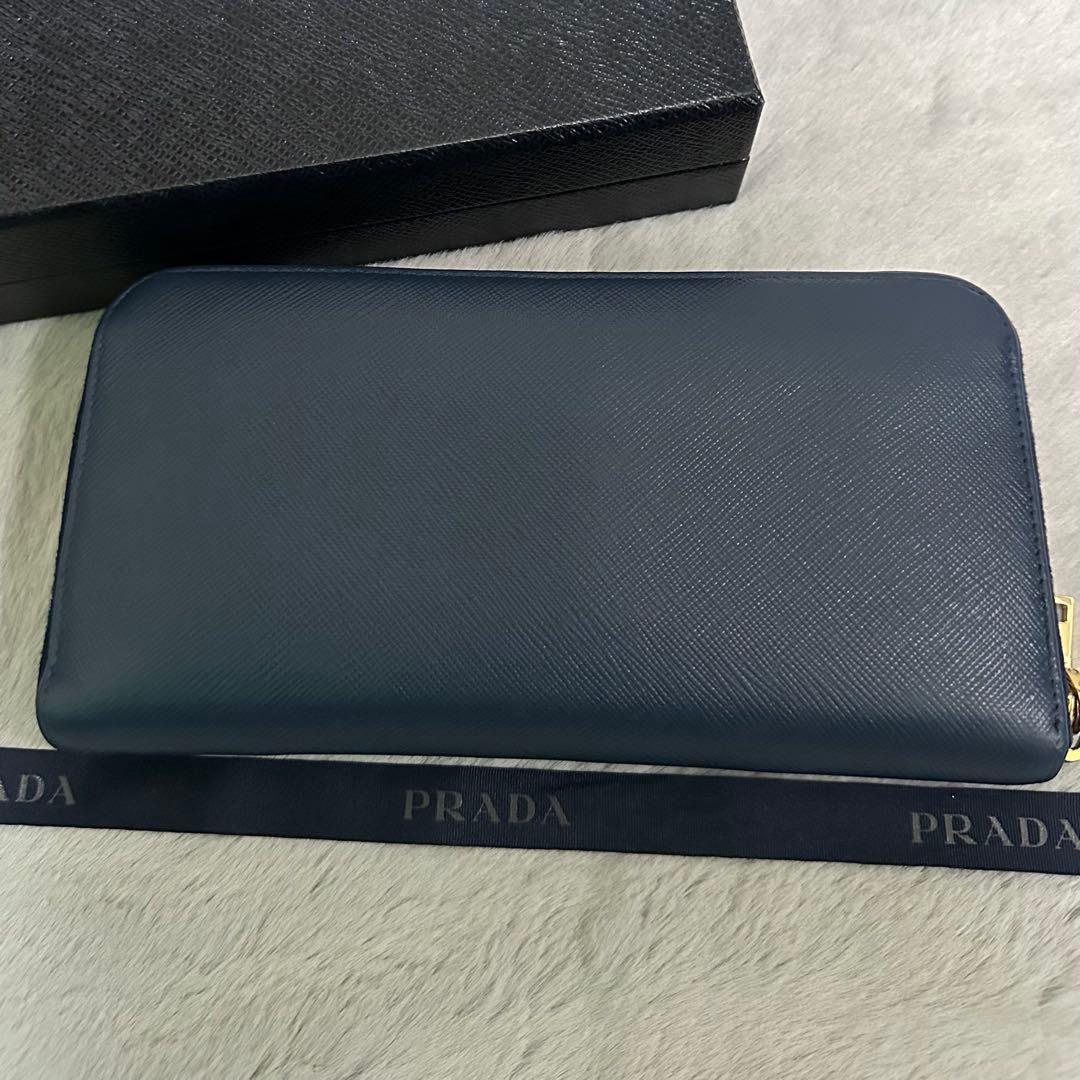 PRADA プラダ　長財布　ラウンドジップ　リボン　ブルー　ゴールドロゴ